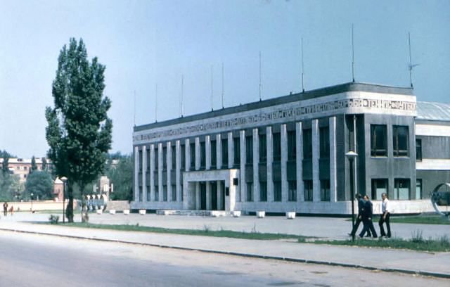 Город