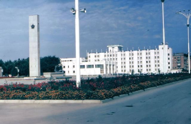 Город