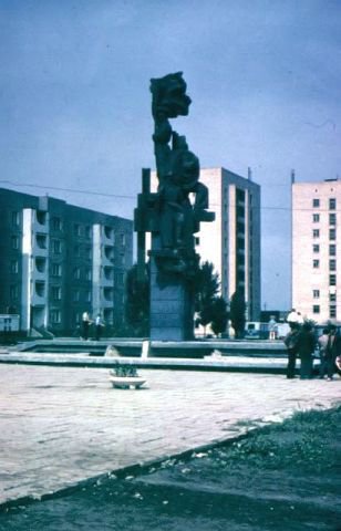 Город