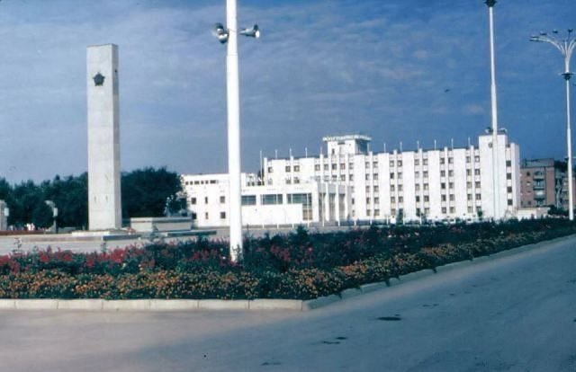 Город