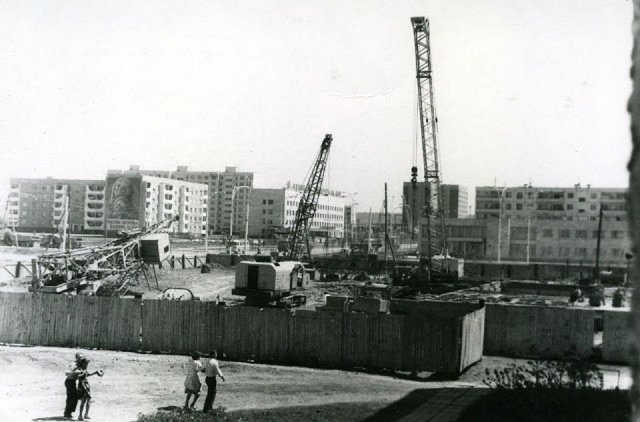 Город