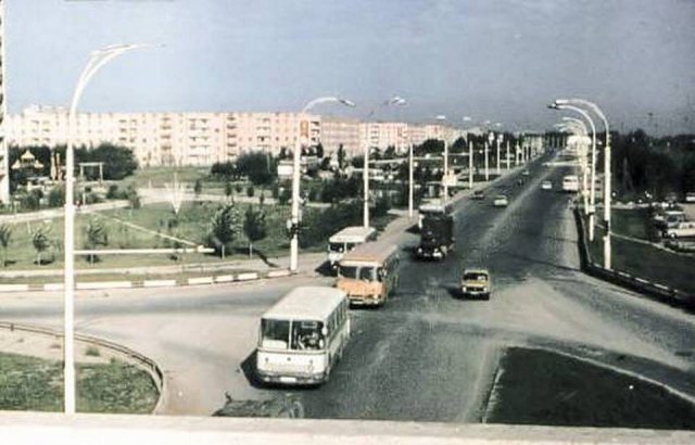 Город