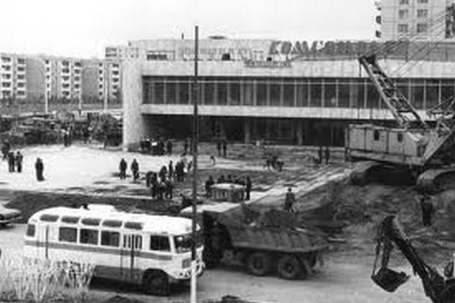 Город