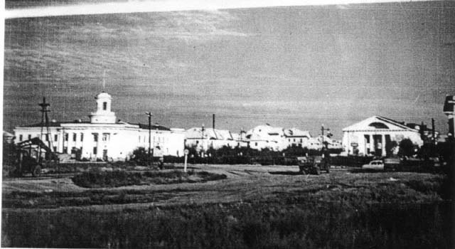 Город