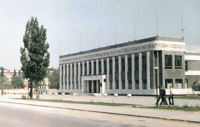 Город
