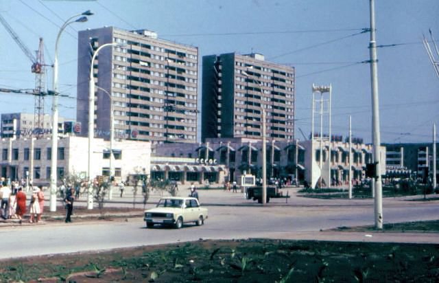 Город